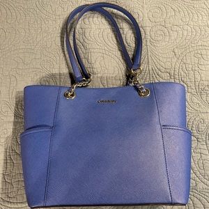 Calvin Klein blue purse. Like new only used a couple times.